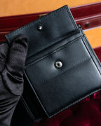 "Dior" Logo engraved bi-fold leather wallet