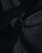 "CHANEL" high-waisted pleated trousers with signature gold button