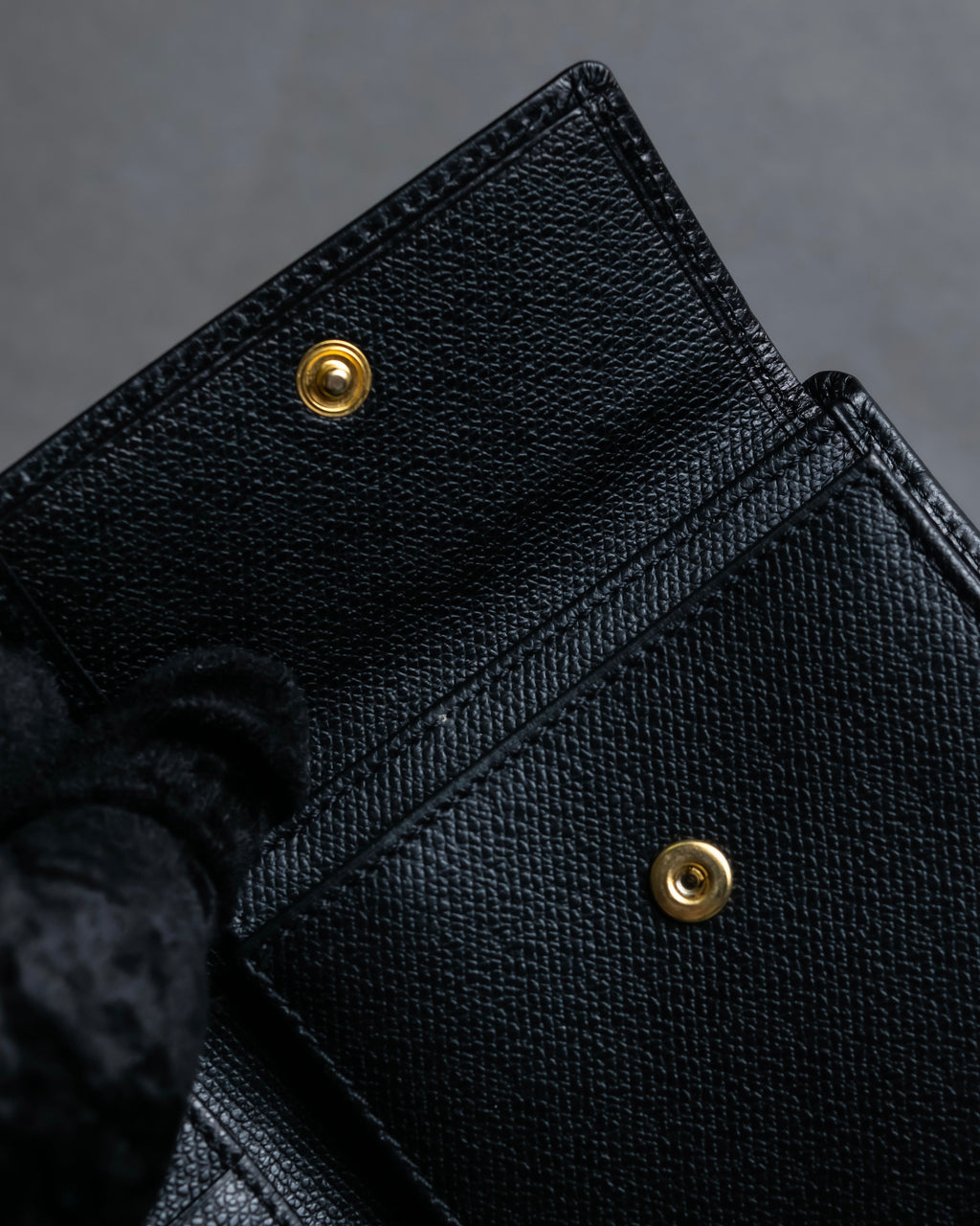 "YVES SAINT LAURENT" Cassandra logo engraved leather bi-fold wallet