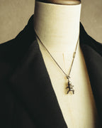 "Saint Laurent" 10's-20's Sculptural doll pendant necklace