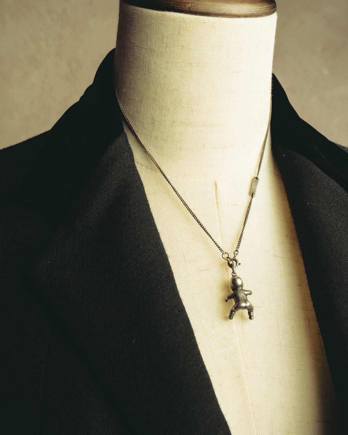 "Saint Laurent" 10's-20's Sculptural doll pendant necklace