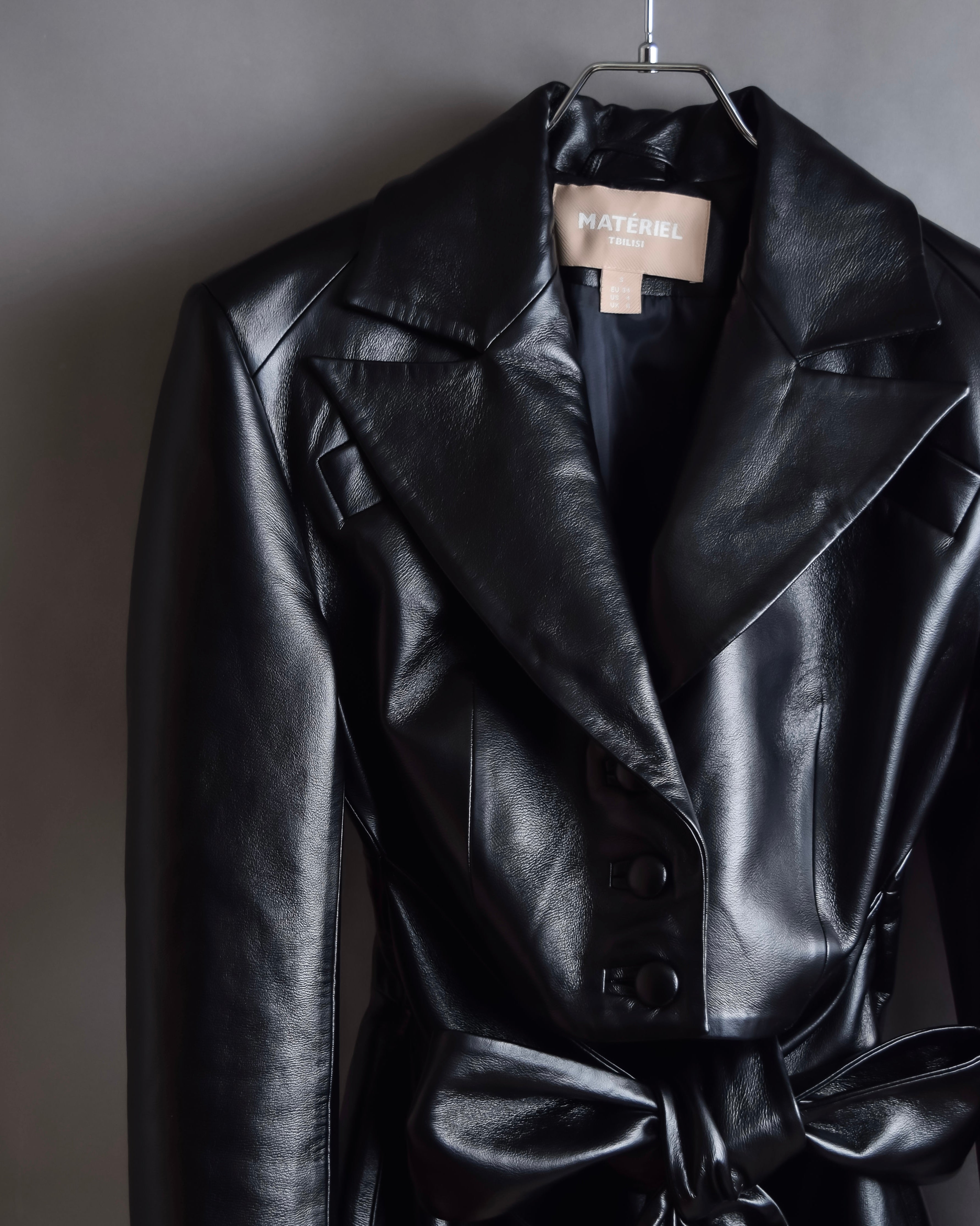 "MATÉRIEL TBILISI" Draped belted synthetic leather long jacket