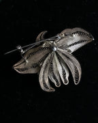 "Vintage petal motif broach"