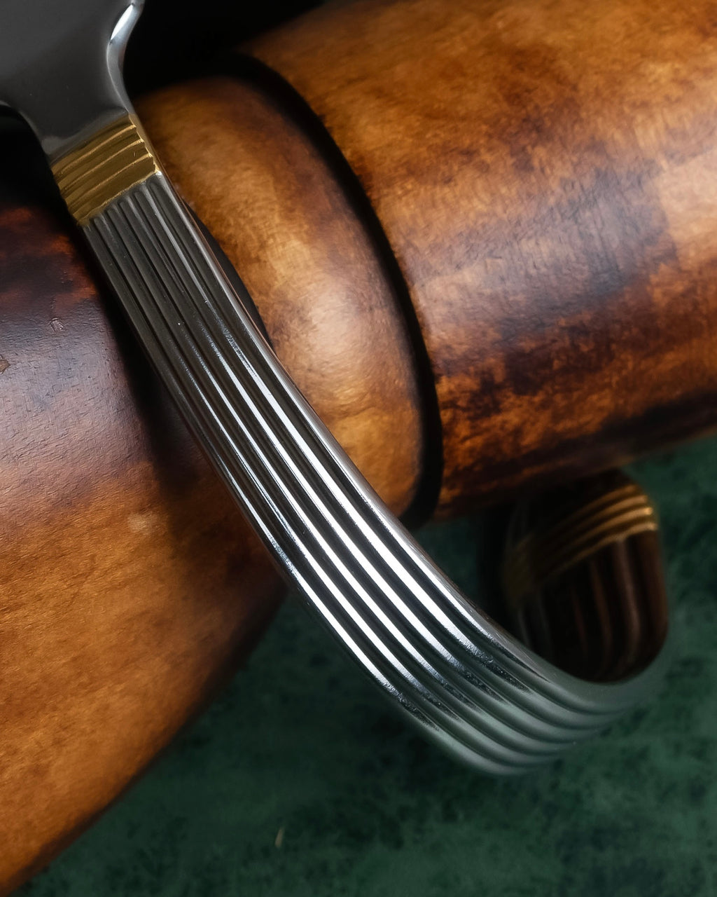 "Christian Dior" Ribbed design gold combination polished silver bangle