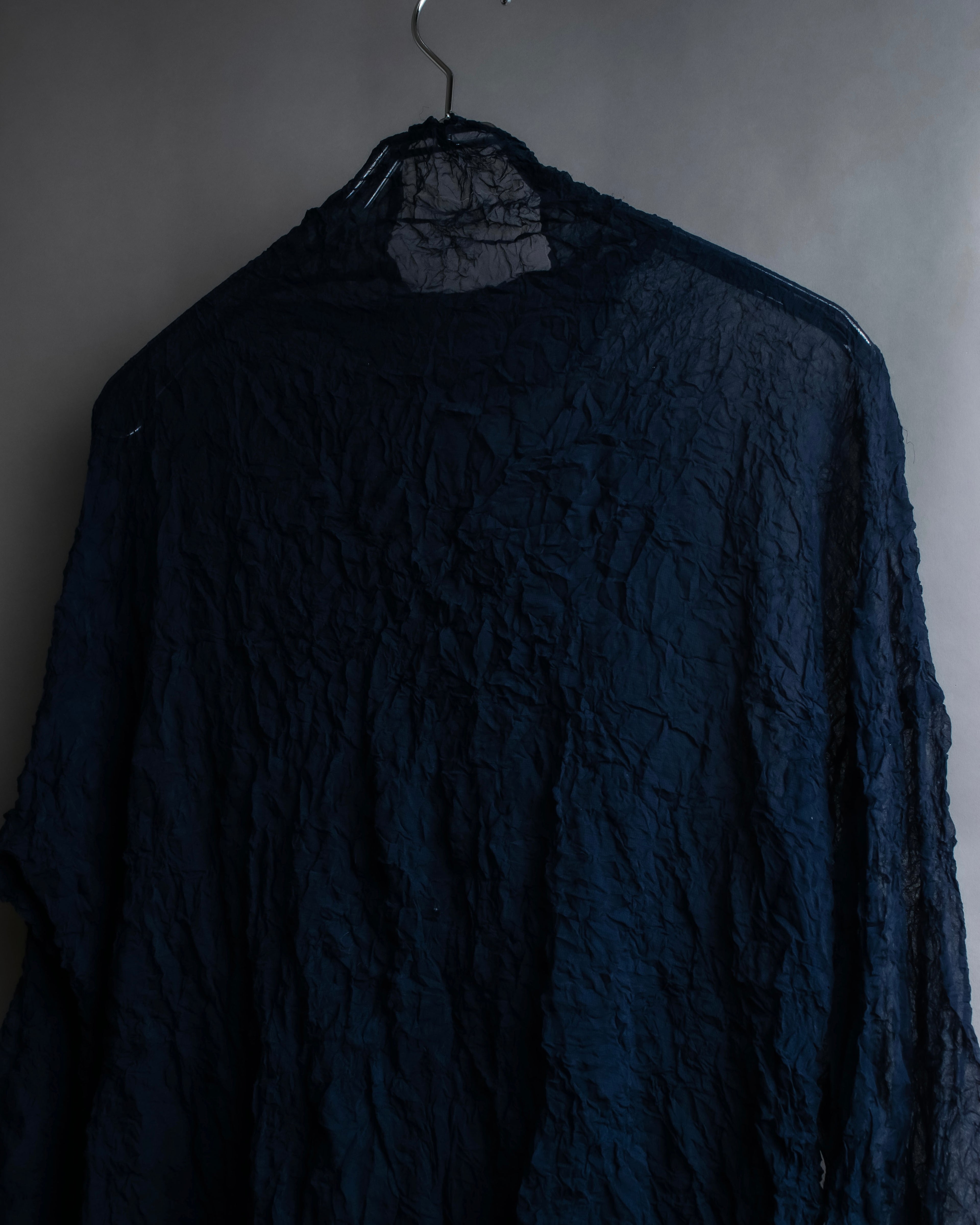 "ISSEY MIYAKE PERMANENTE"
Washed high neck sheer pullover