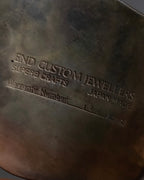 "END CUSTOM JEWELLERS" Square pattern wavy silver bangle