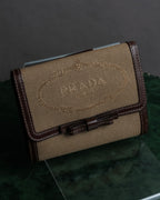 "PRADA" Logo engraved canvas＆leather combination short wallet