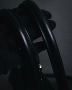 "Y’s" 22AW sculptural kiss-lock leather bag