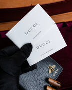 "GUCCI" Gold bee motif animalier bi-fold leather wallet