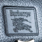 "BURBERRYS" Cylindrical design logo engraved leather one handle bag