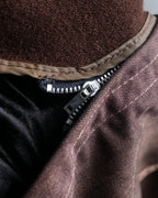 "CHRISTIAN DIOR MONSIEUR"
 Dark brown oversized trench coat