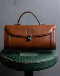 "BURBERRYS" Horizontally shaped brown leather one-handle bag
