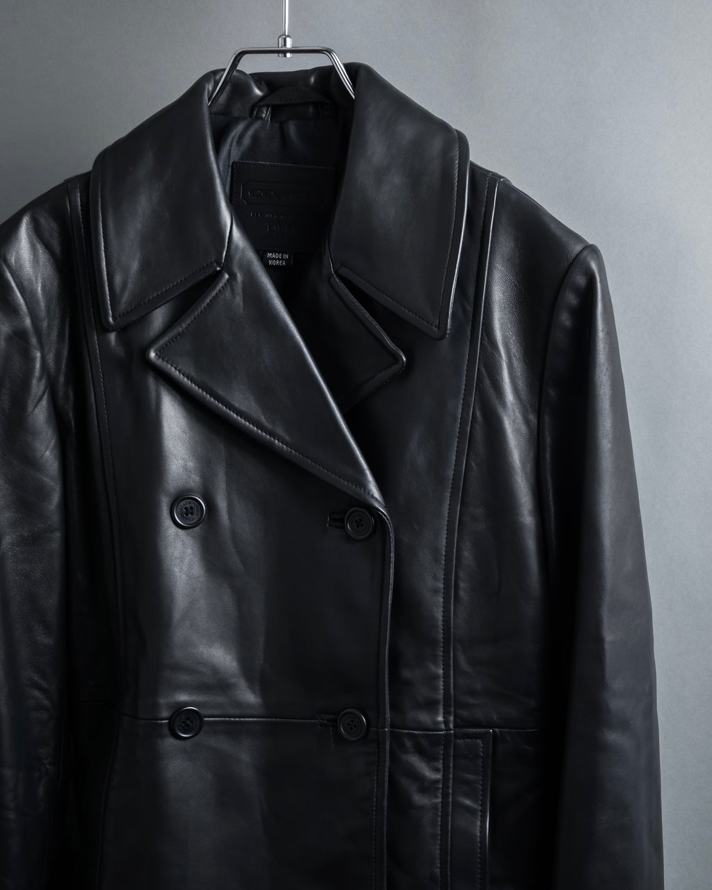 "COACH" Double-breasted panel work design leather coat