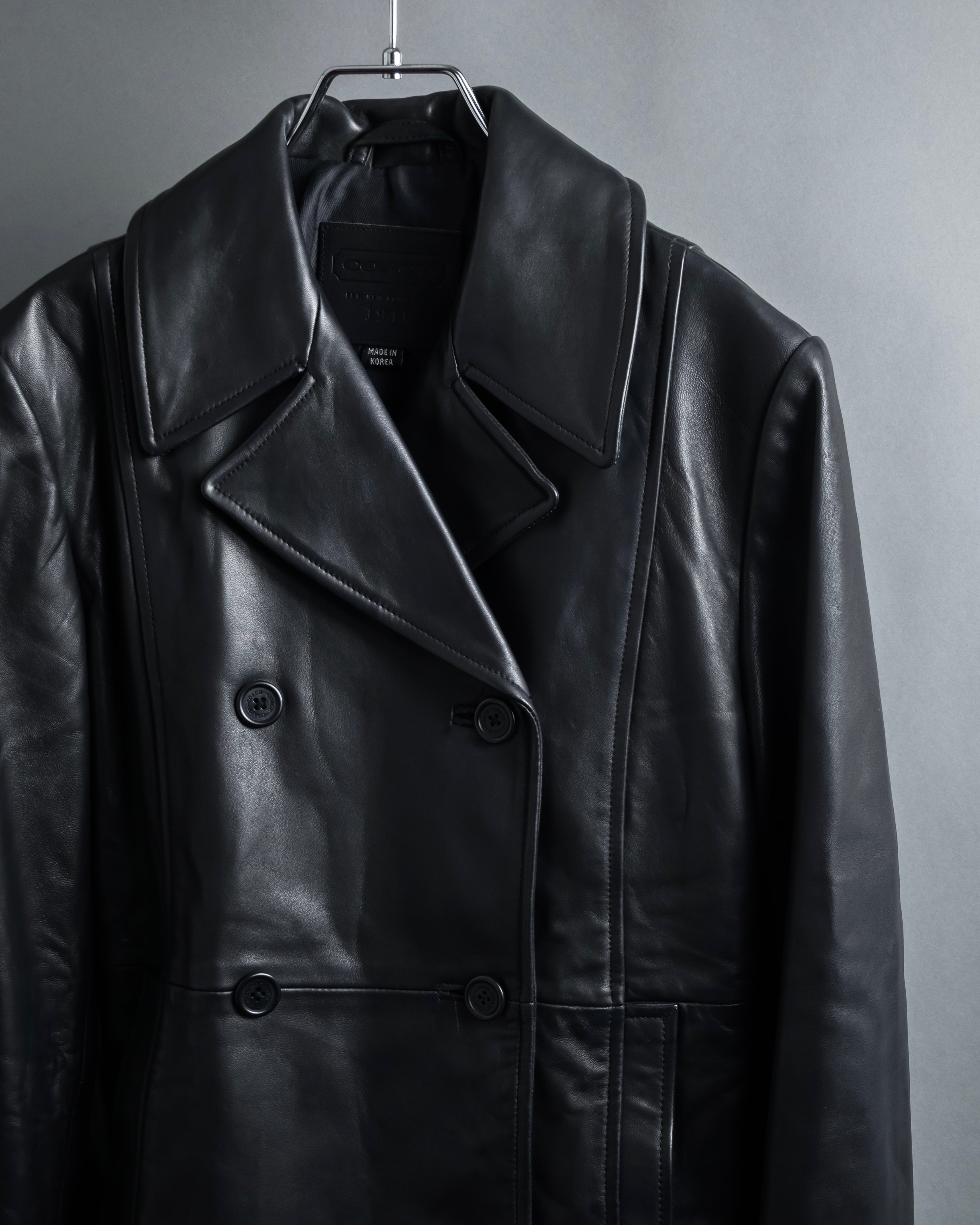 "COACH" Double-breasted panel work design leather coat