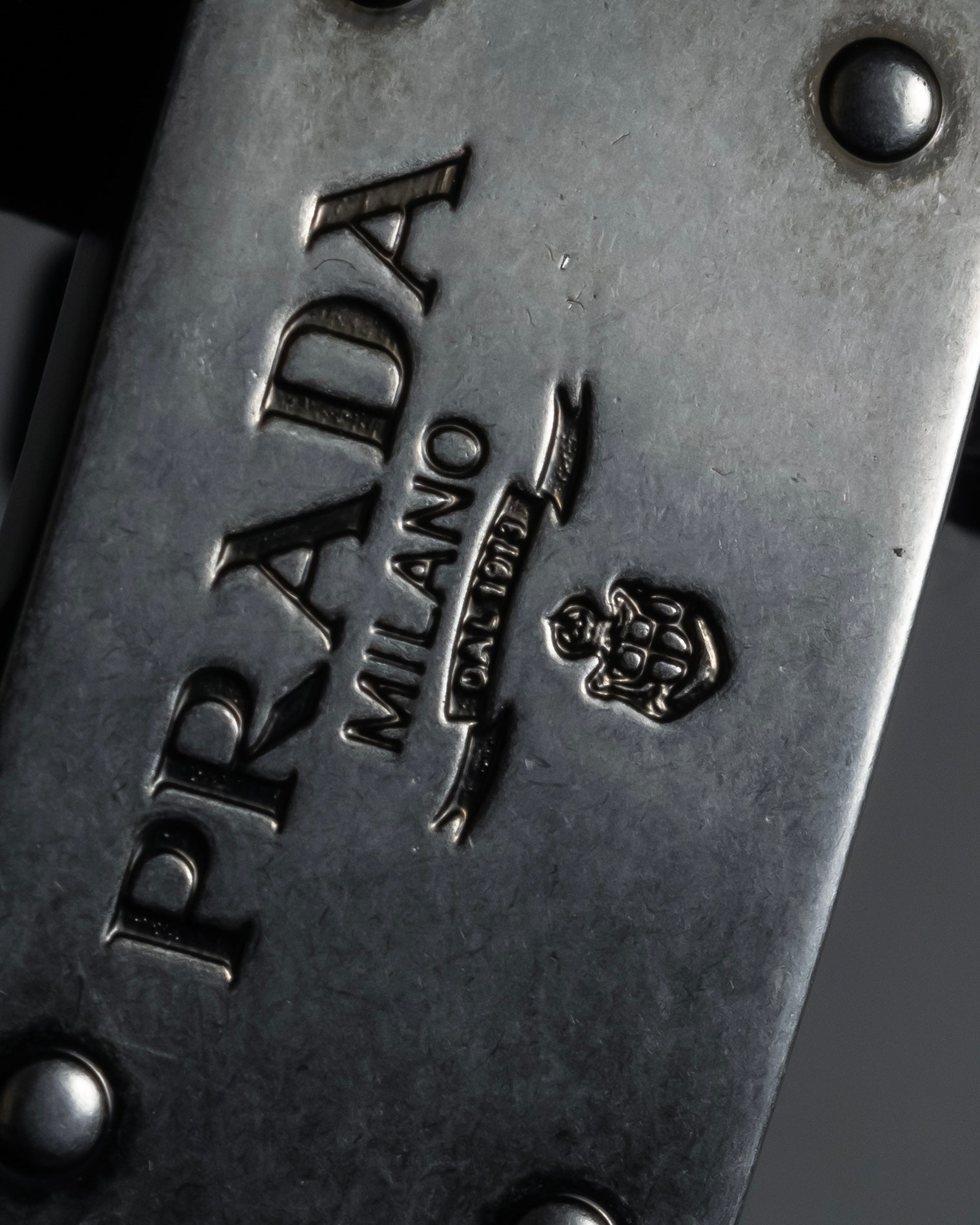 "PRADA" Logo engraved metal plate design leather bracelet