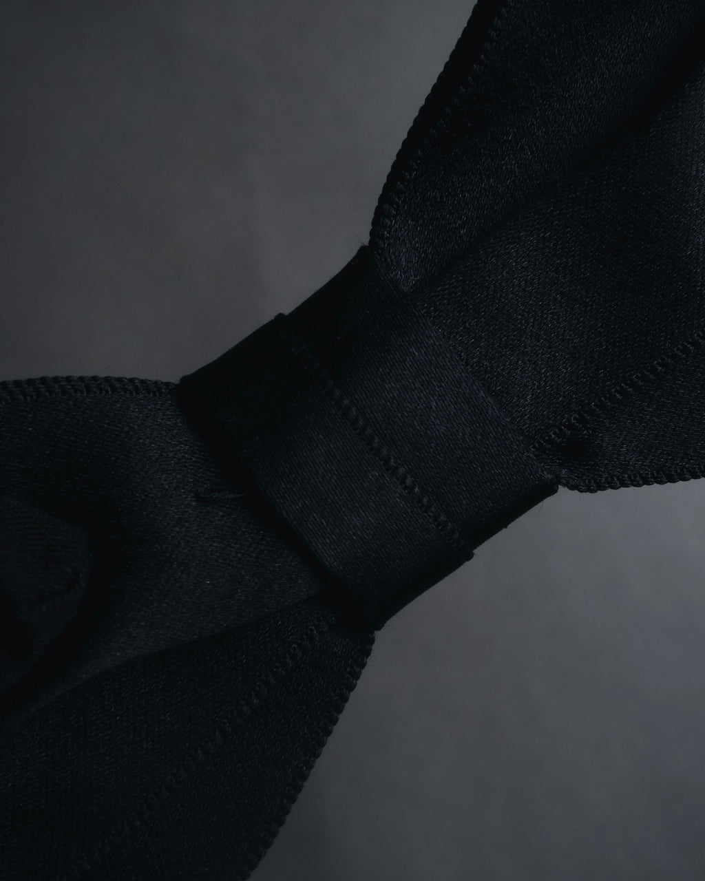 "CHANEL" 90’s black satin and grosgrain ribbon brooch