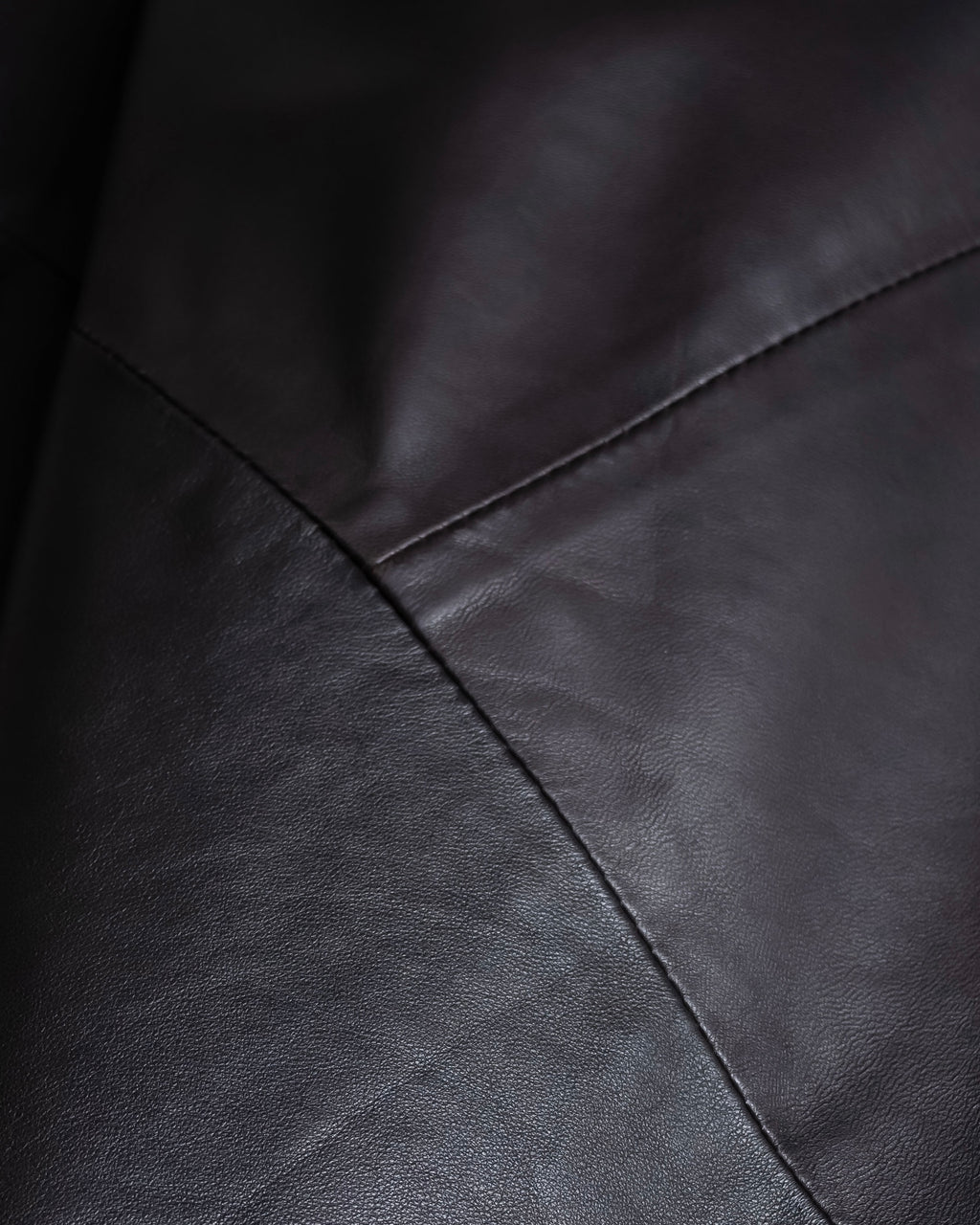 "HARVEY LOGAN" Diagonal cut design lamb leather flare skirt