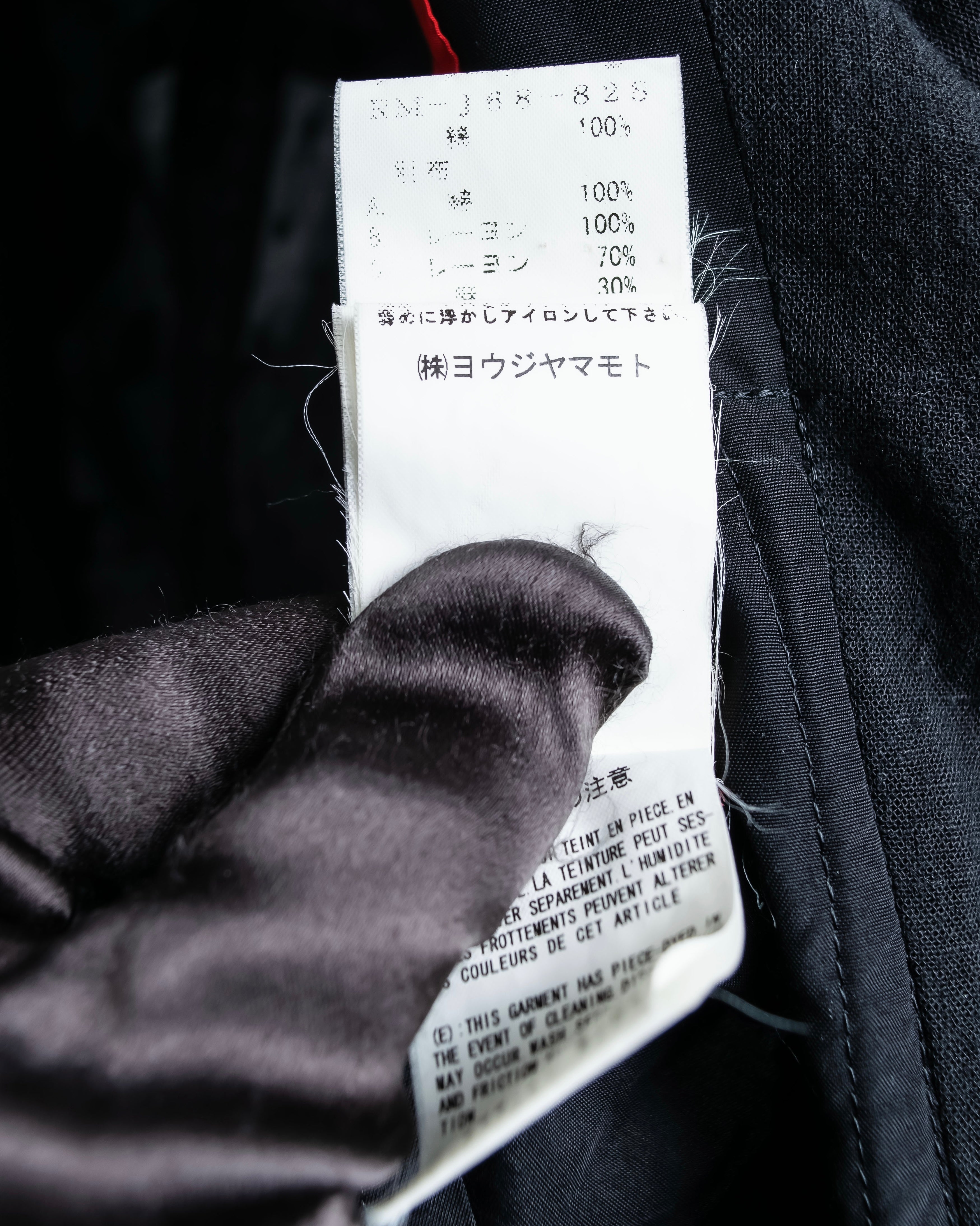 “Y’s COMPOSITION: SEE ATTACHED LABEL” Layered design multi buttons tail coat