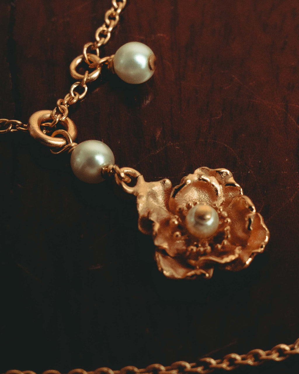 “Christian Dior” 2019-2025 Gold floral charm necklace with pearl accents