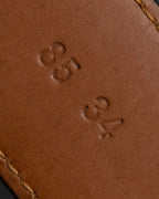 "Berluti" Patina finish curved buckle leather belt