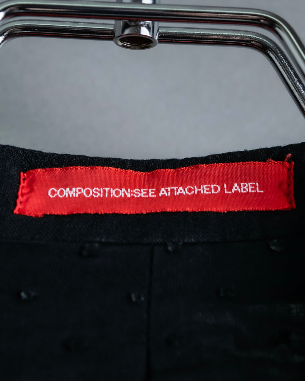 “Y’s COMPOSITION: SEE ATTACHED LABEL” Layered design multi buttons tail coat