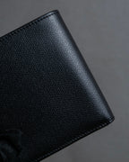 "YVES SAINT LAURENT" Cassandra logo engraved leather bi-fold wallet