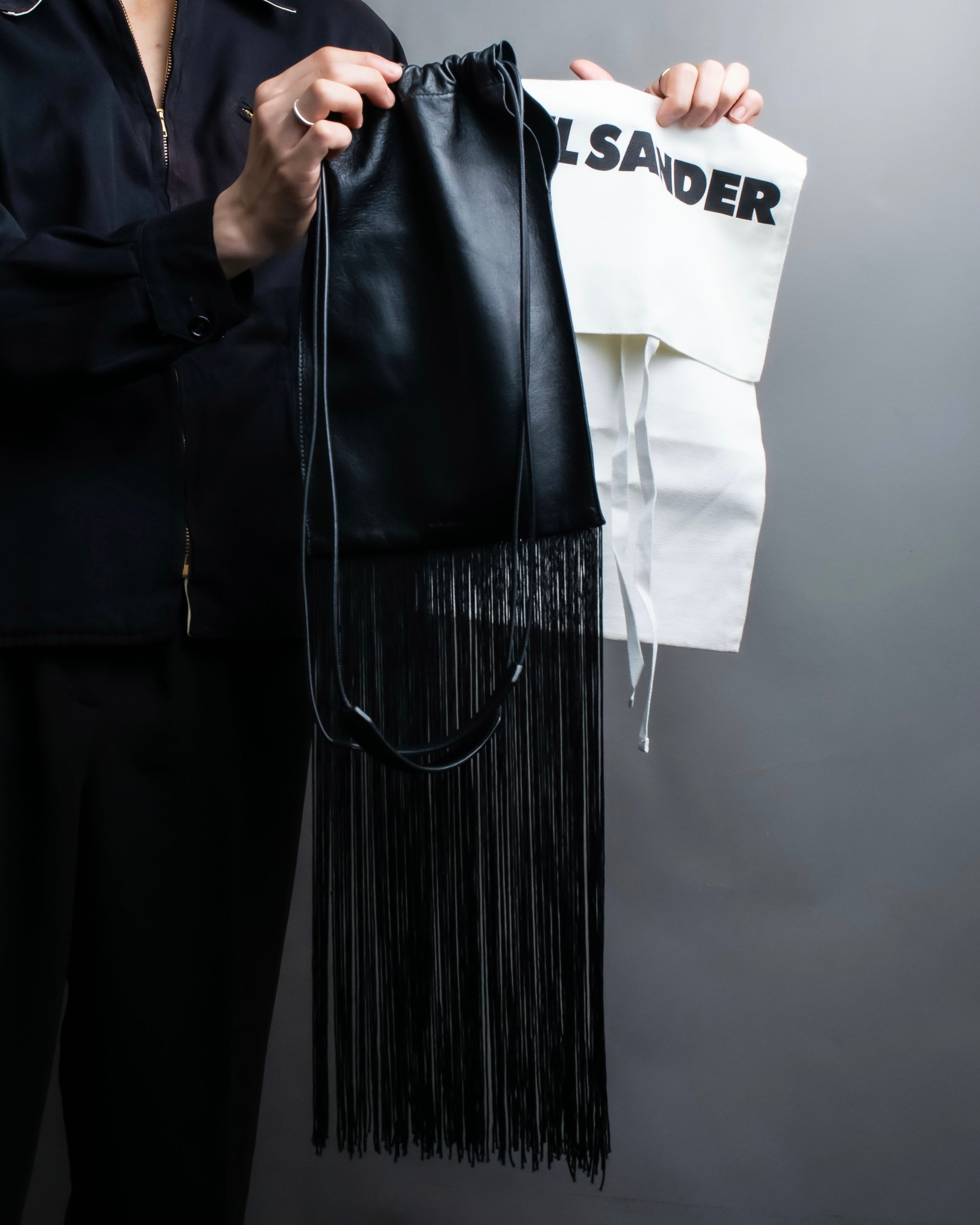 “JIL SANDER” Fringe detail flat drawstring shoulder bag