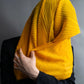 "PLEATS PLEASE ISSEY MIYAKE" Yellow orange color pleated stole