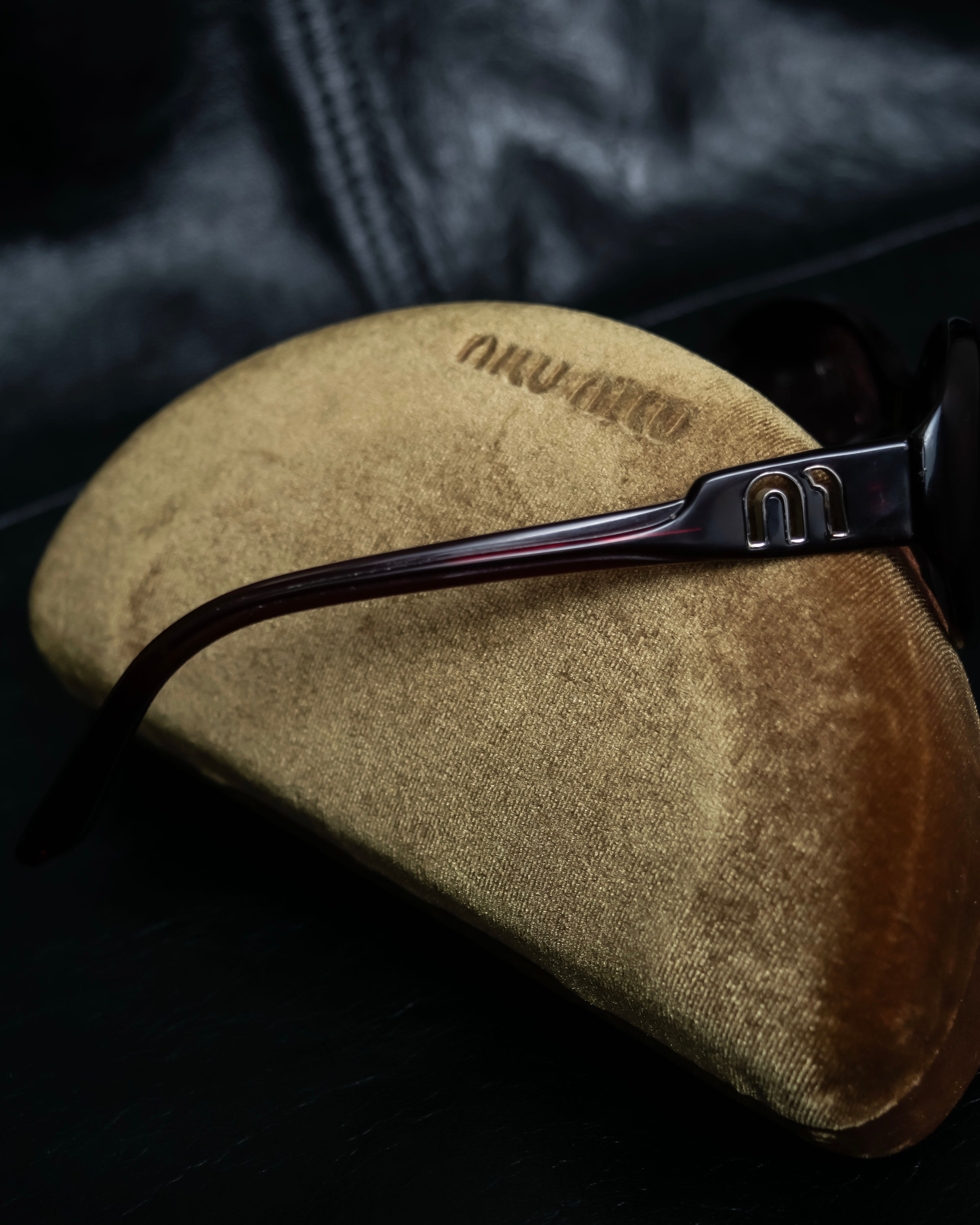 "Miu Miu" reddish brown sporty sunglasses