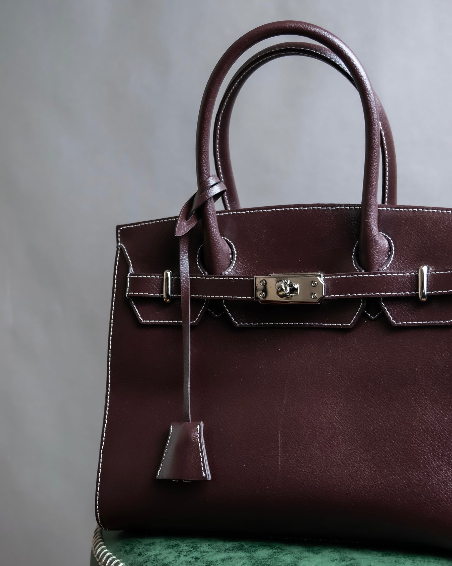 "HAMANO TOKYO" Trapezoidal shape iconic hardware leather one handle bag