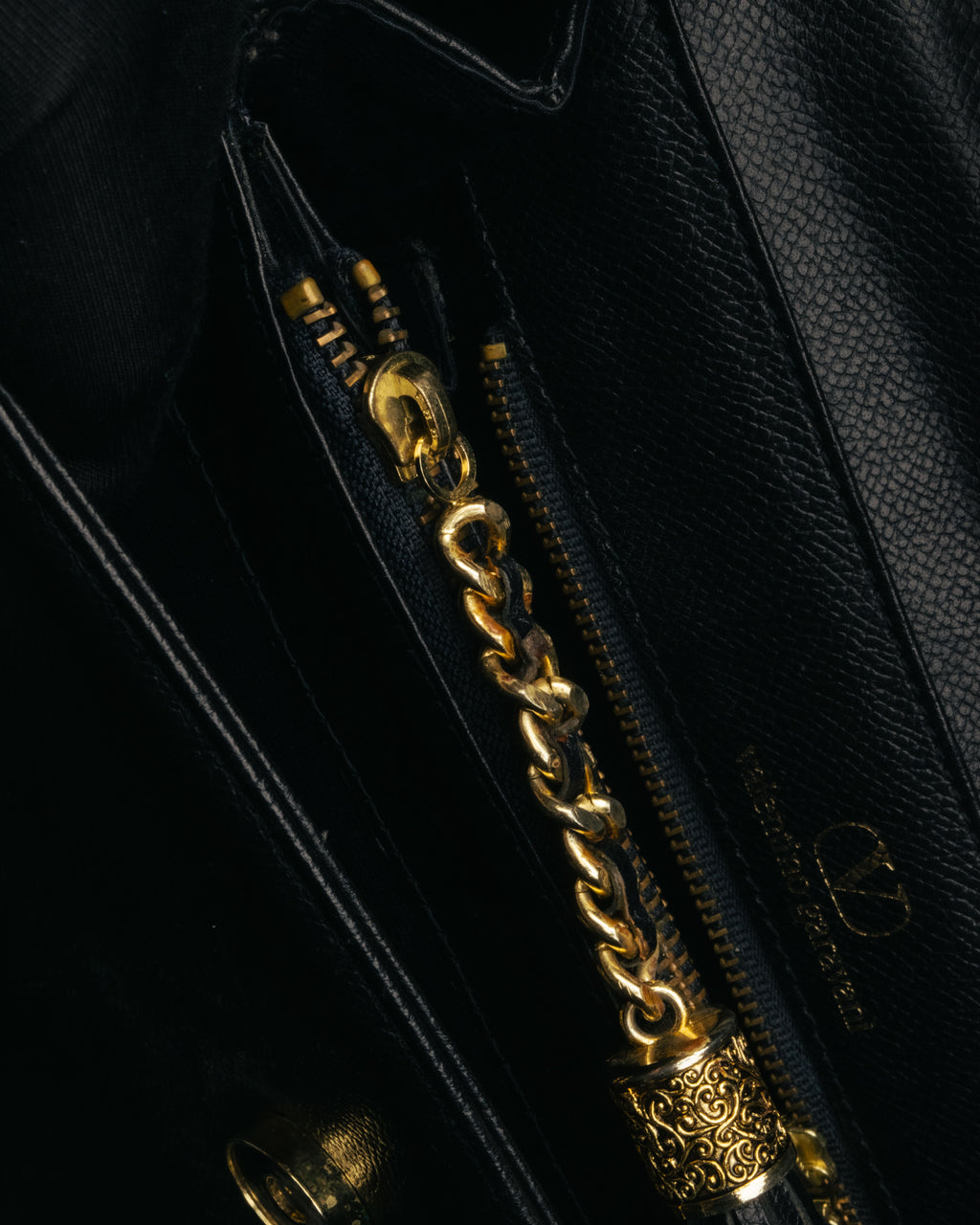 “Valentino Garavani” 90’s-00’s Structured V logo leather handbag