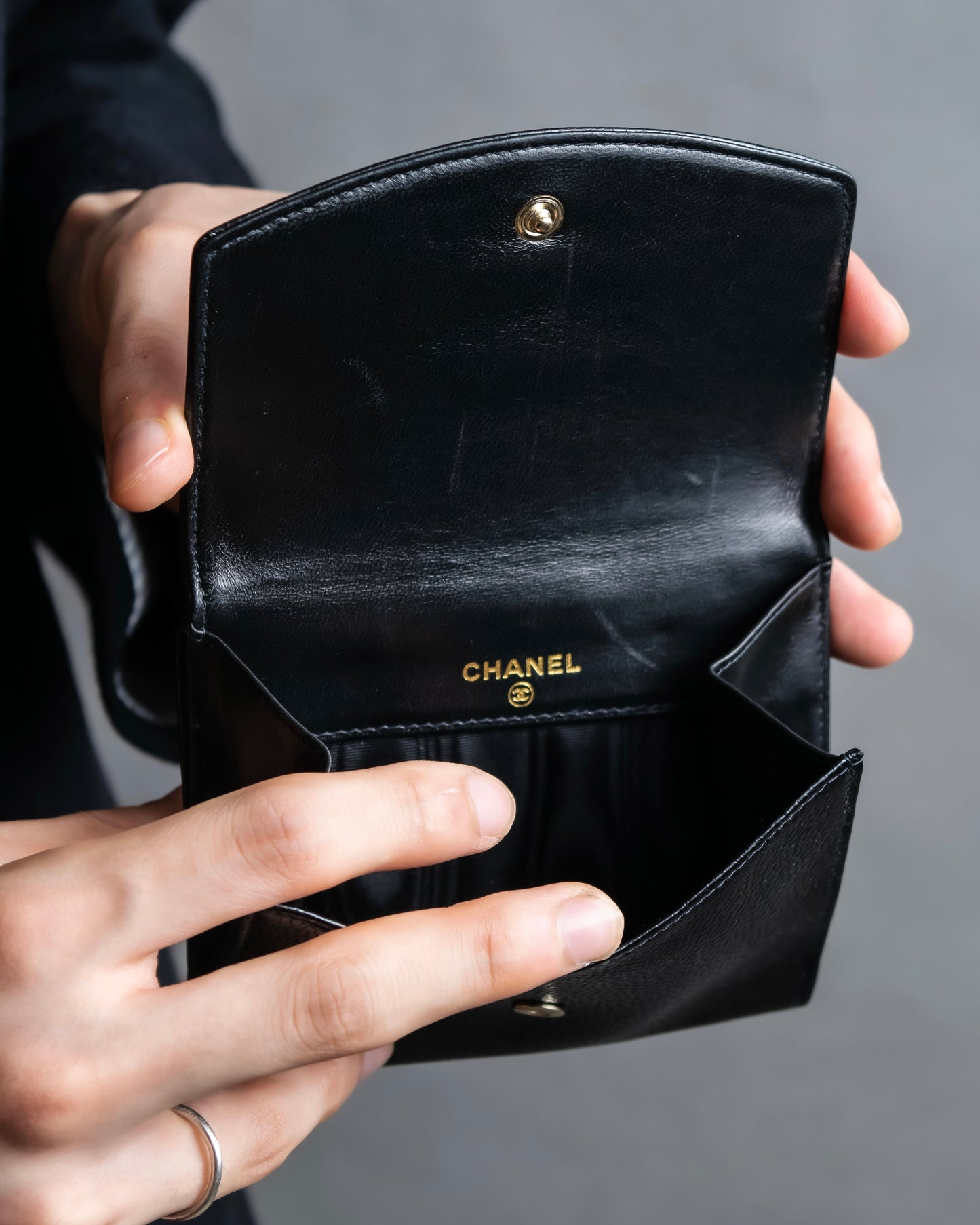 "CHANEL" Coco Mark engraved caviar skin bi fold wallet