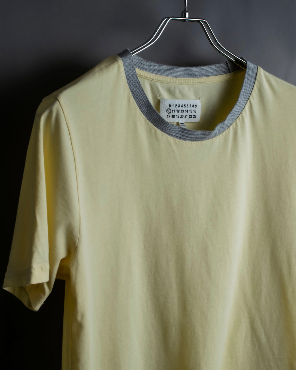 "MAISON MARGIELA"
Pastel yellow color box silhouette T-shirt