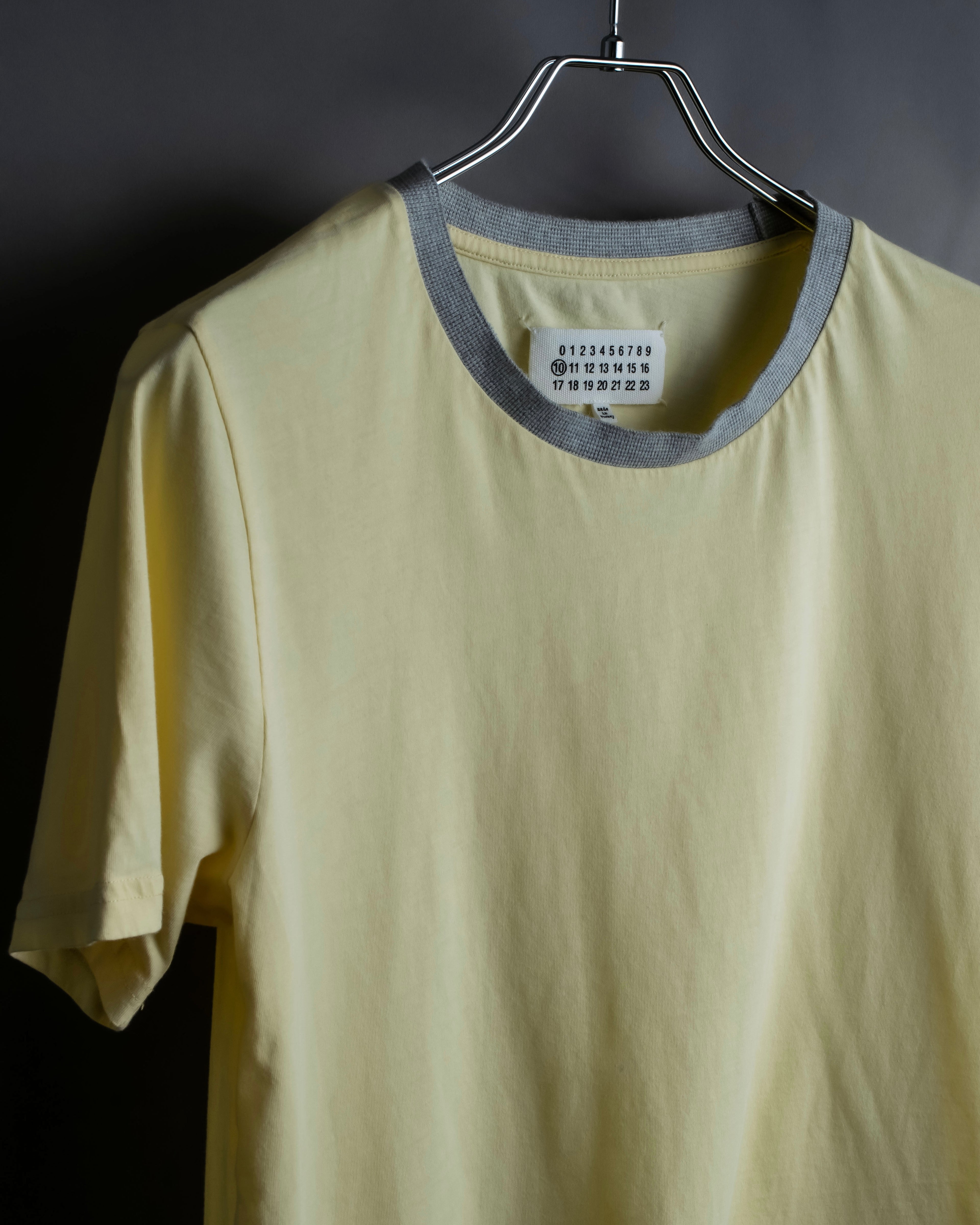 "MAISON MARGIELA"
Pastel yellow color box silhouette T-shirt