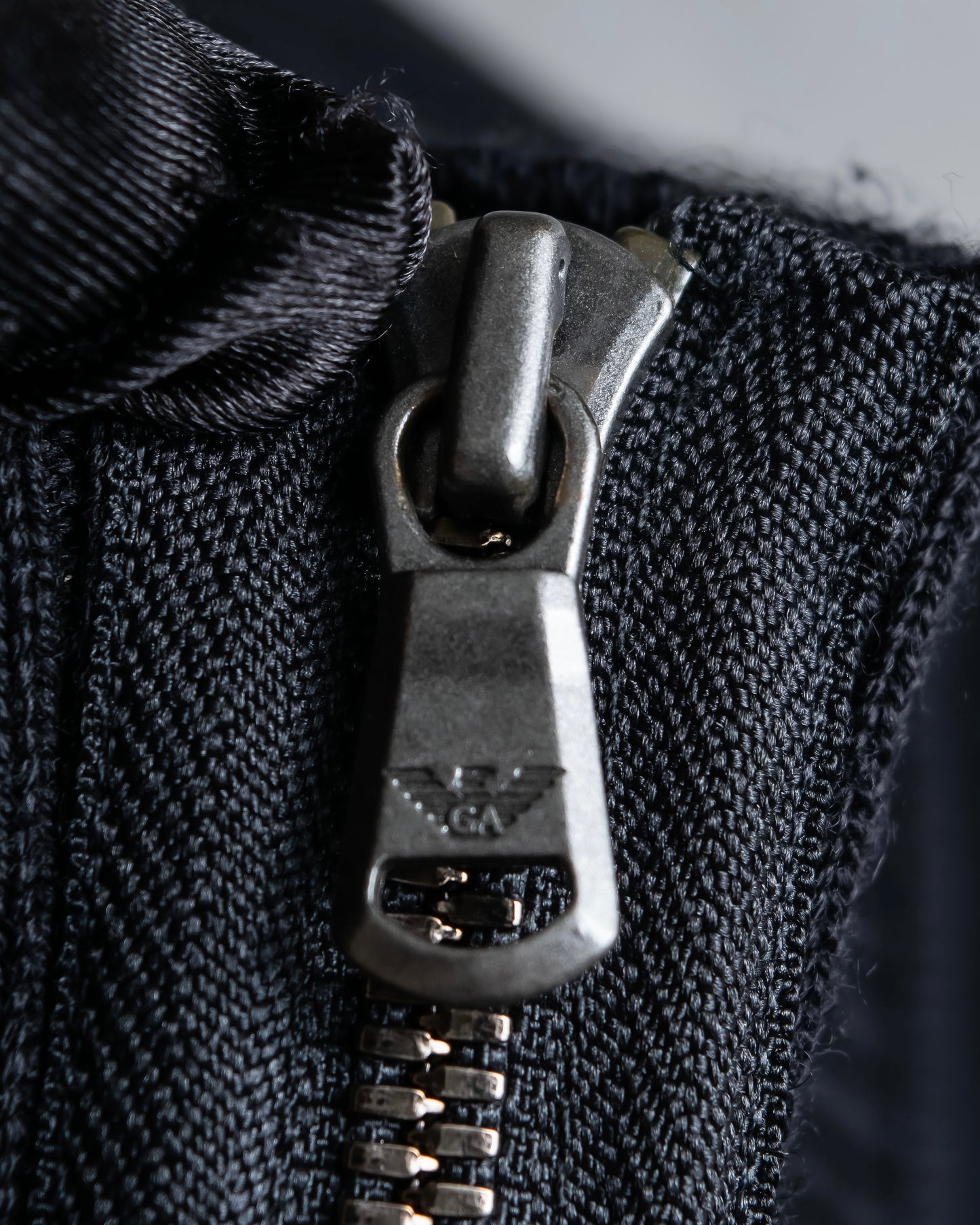 "EMPORIO ARMANI"  Piping design double zipper driver's knit