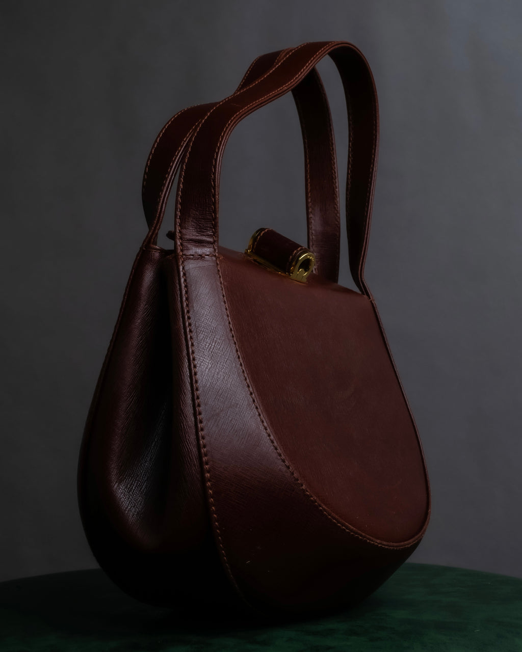 "Salvatore Ferragamo" Half-moon shaped Bordeaux color leather shoulder bag