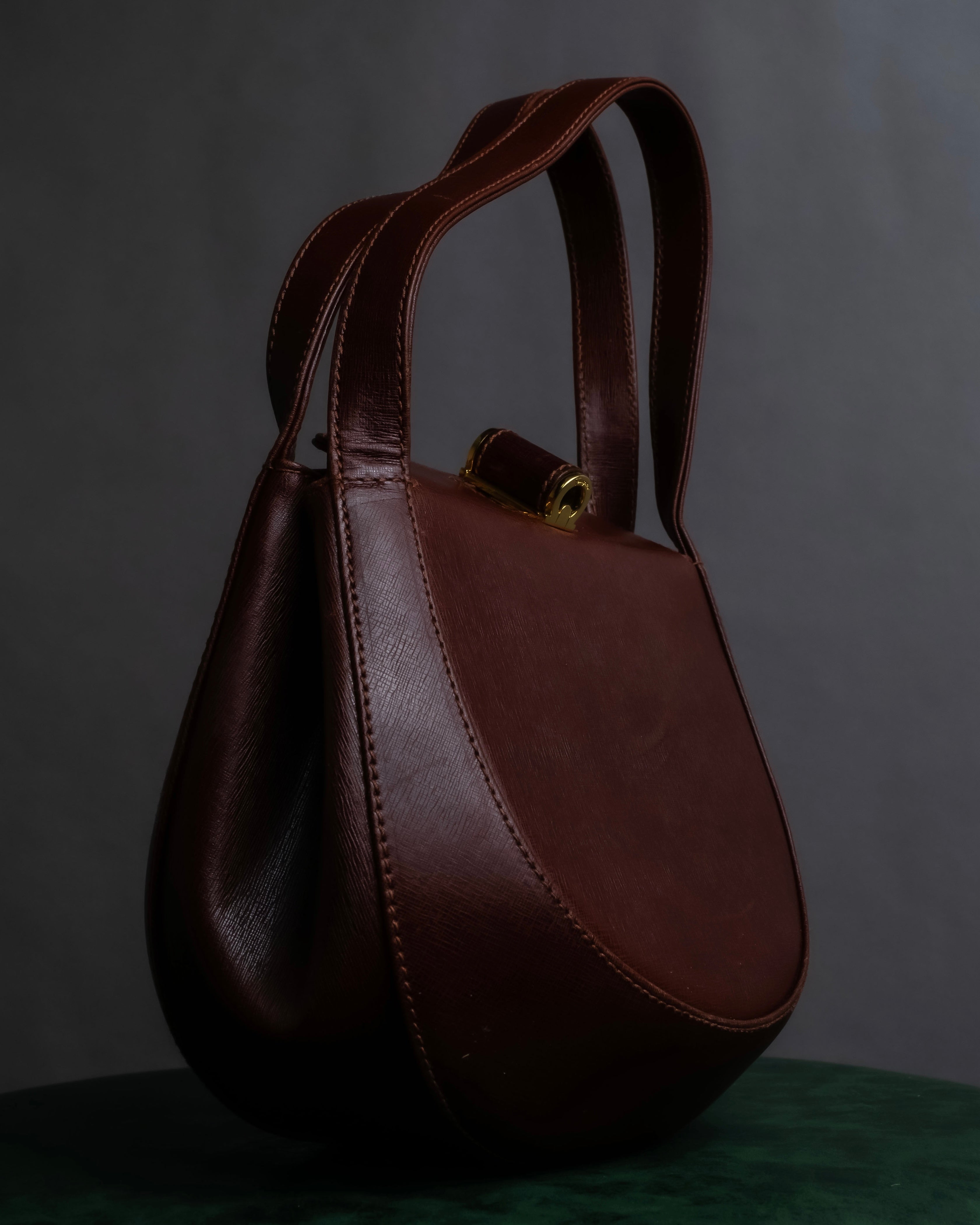 "Salvatore Ferragamo" Half-moon shaped Bordeaux color leather shoulder bag