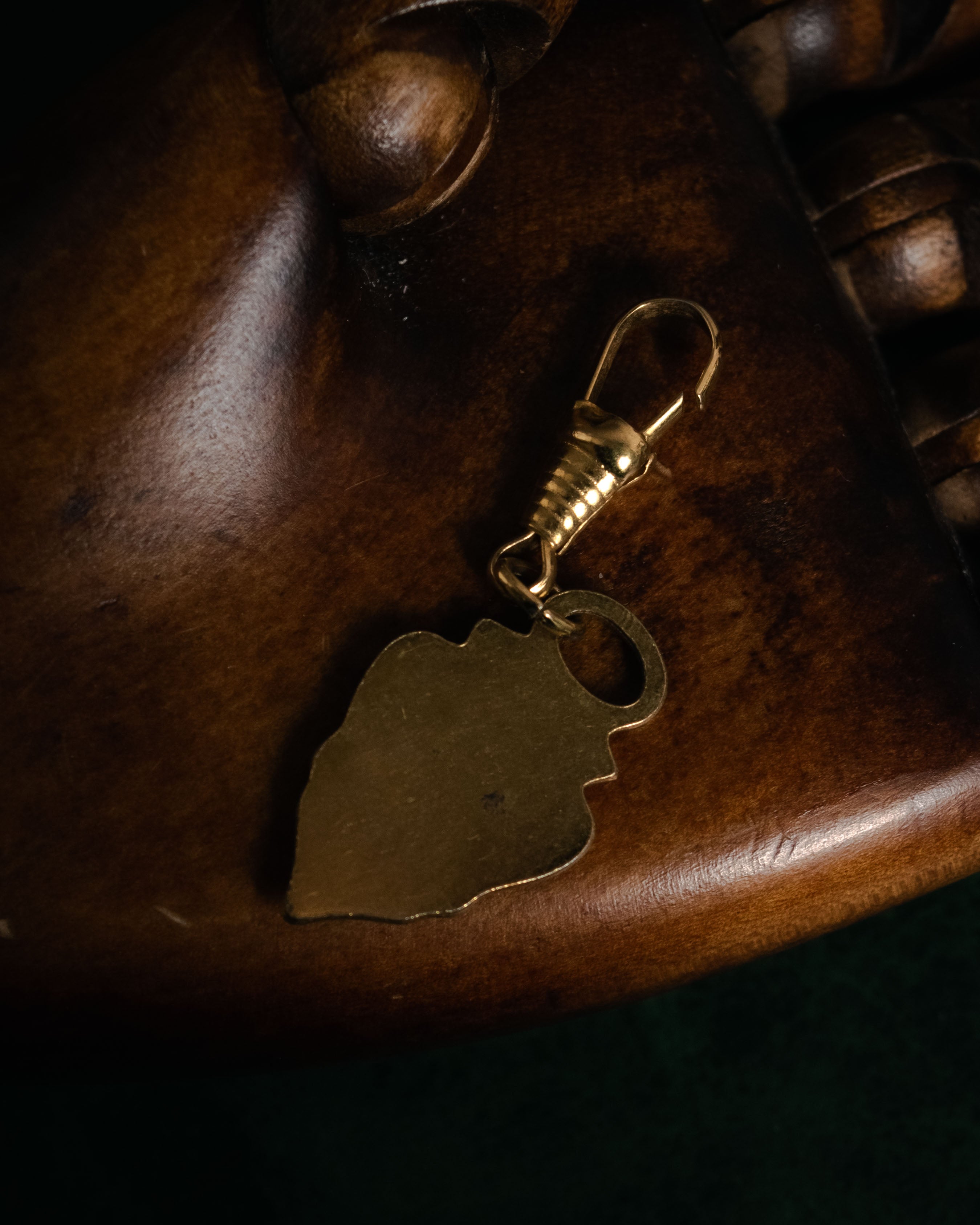 “GUCCI” 70’s-80’s Crest shield charm with spring clasp