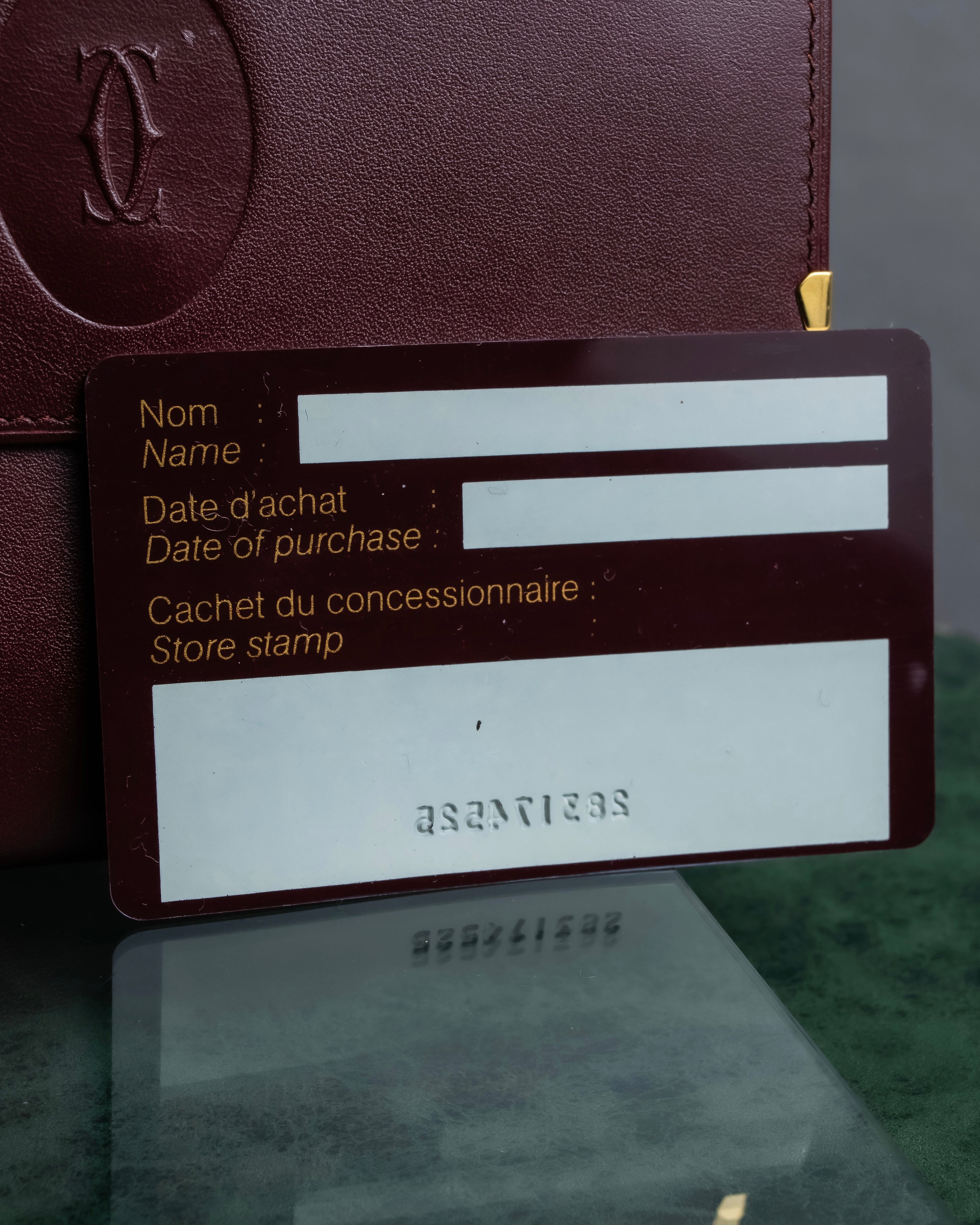 "Cartier" Les Must de Cartier bordeaux color leather wallet