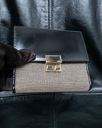 "GUCCI" Canvas and leather bi-fold wallet