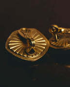 "Yves Saint Laurent" 80's-90's Sculptural black cabochon clip-on earrings