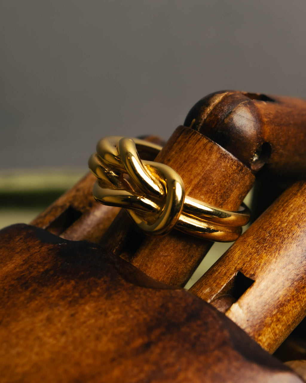 "HERMES" Sculptural gold tone knot Atame scarf ring