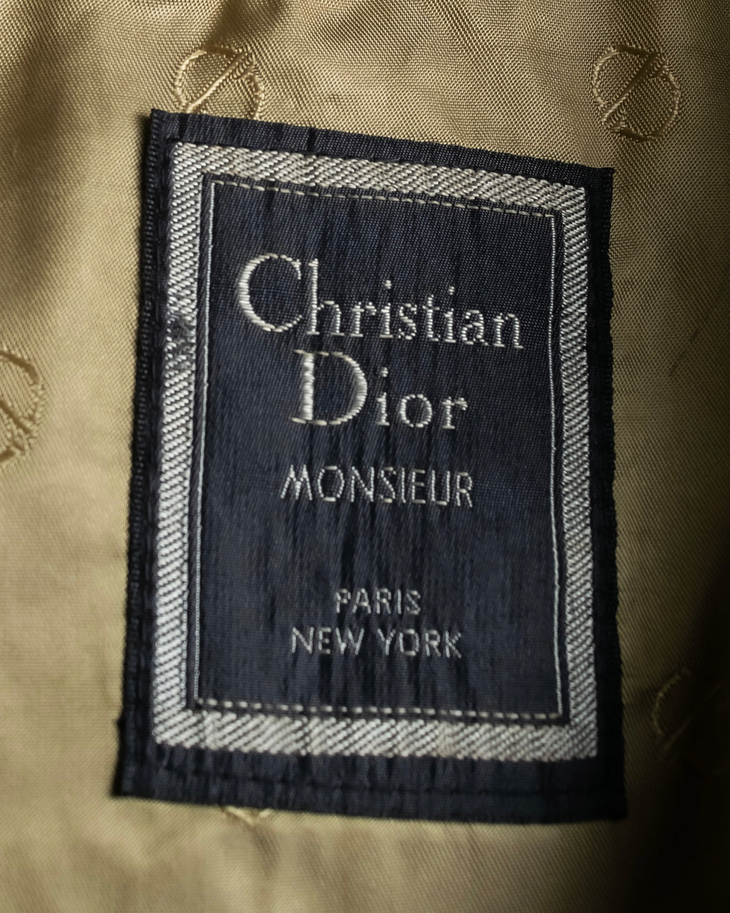 "CHRISTIAN DIOR MONSIEUR"
 Dark brown oversized trench coat