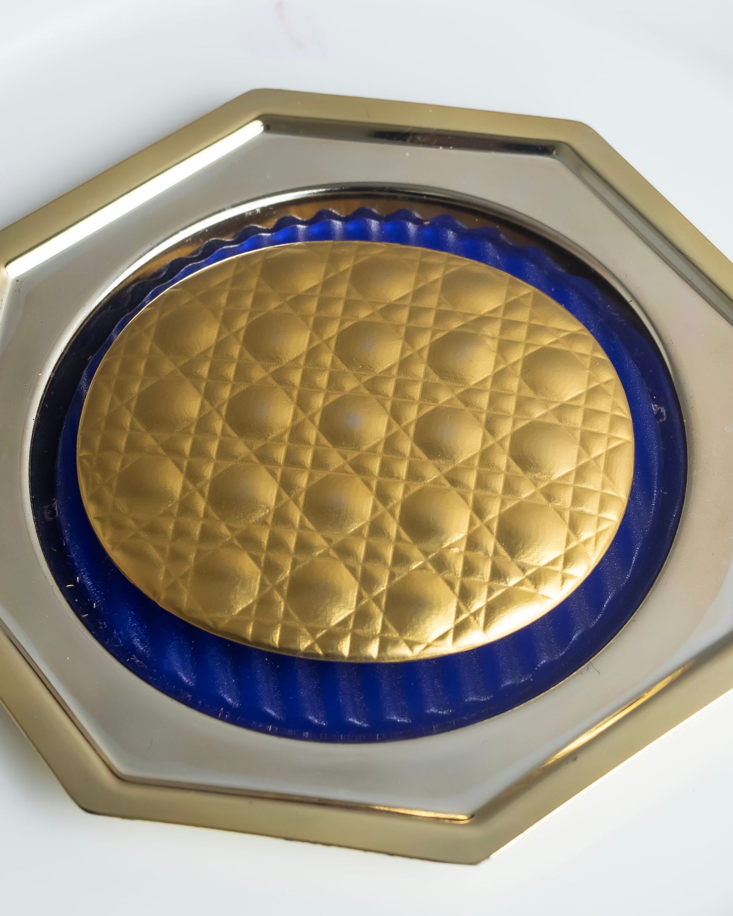 "Christian Dior" Cannage pattern engraved gold hand mirror