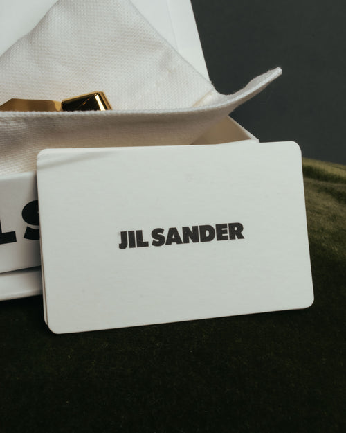 “JIL SANDER” 2021 sculptural ribbon metal clip earrings