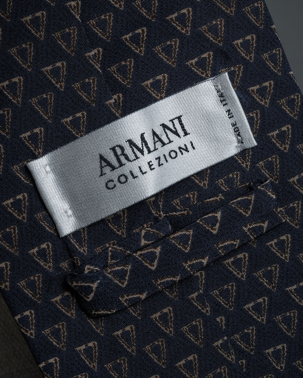 "ARMANI COLLEZIONI" Repeated triangle motif silk neck tie