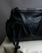 "MARNI" Side ribbon design rounded body leather bag