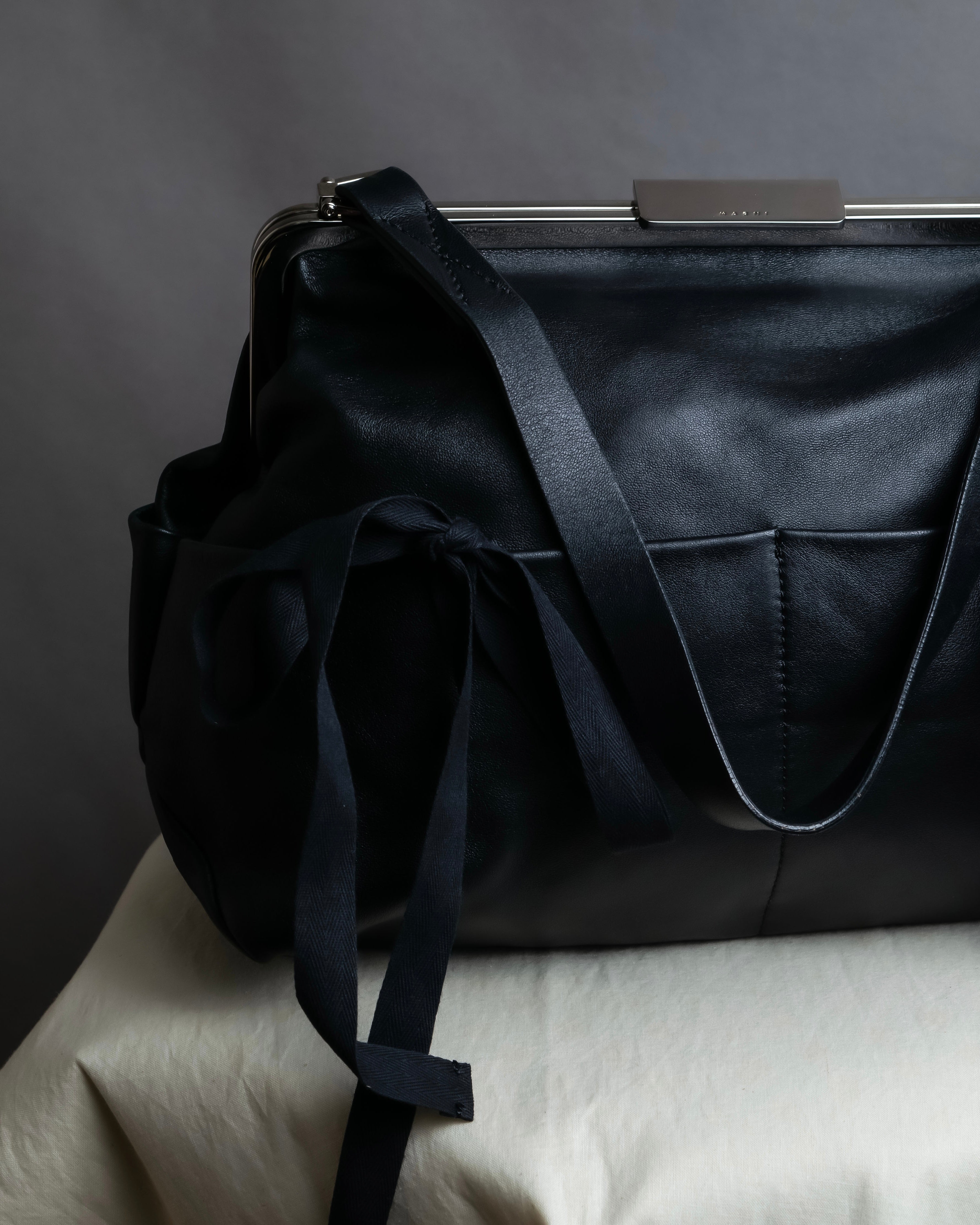"MARNI" Side ribbon design rounded body leather bag