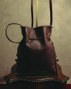“YVES SAINT LAURENT“ 90’s-00’s Leather drawstring shoulder bag