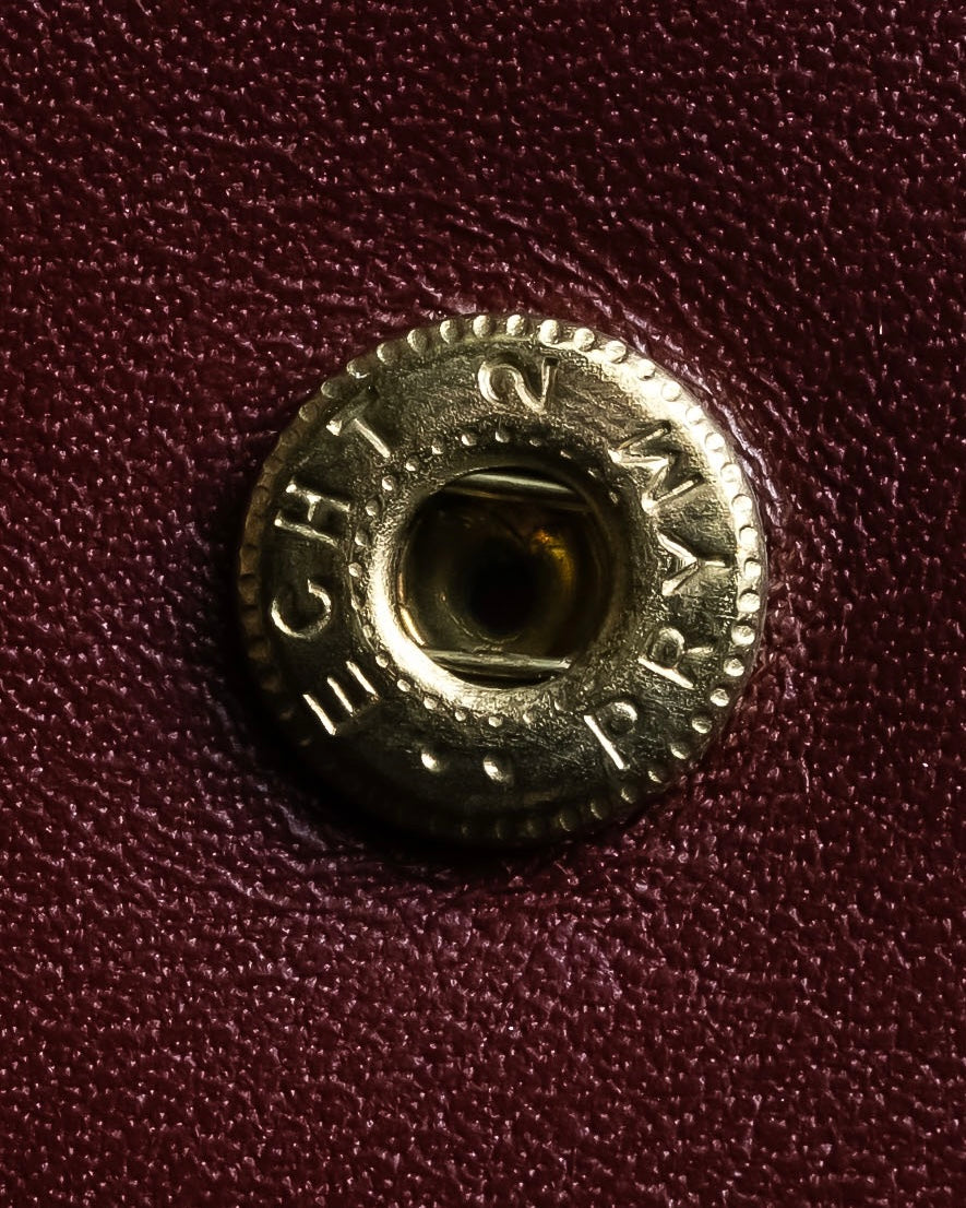 "Cartier" Les Must de Cartier bordeaux color leather wallet